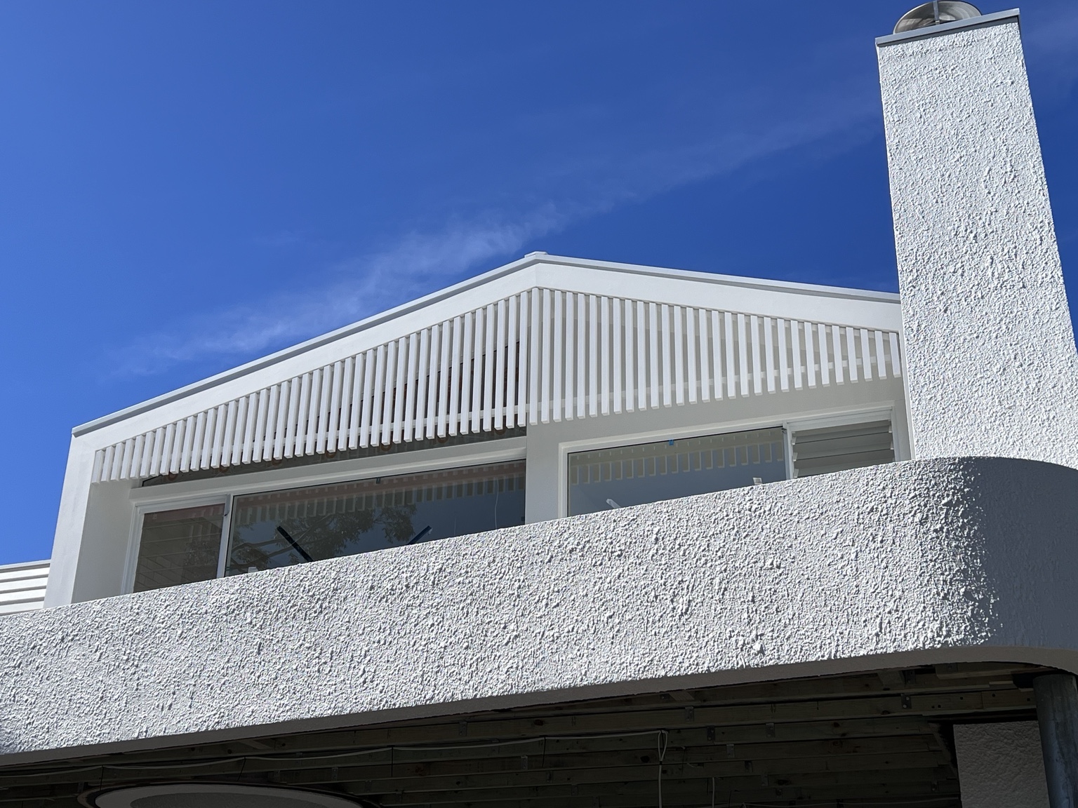 Modern architectural home with custom aluminium screening